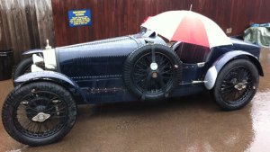 Don't forget your umbrella! Car at Pre-War Prescott waits for the sunshine.